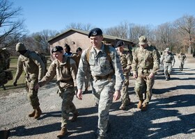 Members of the 459th Security Forces Squadron participate in a ruck march during Unit Training Assembly weekend, March 7, 2020, at Joint Base Andrews, Md. The unit participated in the march as part of their physical fitness training. (U.S Air Force photo/SrA Andreaa Phillips)