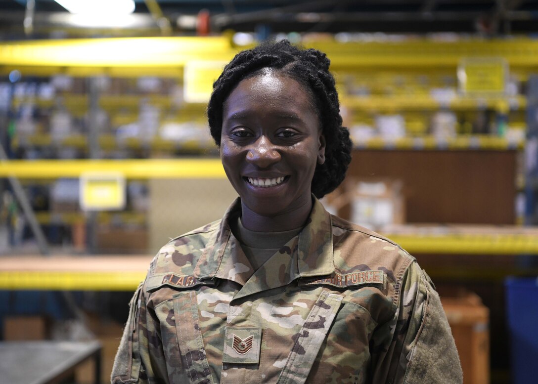 Technical Sgt. Barbara Clark gives insight into the Traffic Management Office at the 104th Fighter Wing. Clark works as a supervisor overseeing inbound and outbound shipments as well as managing airmens training.  (U.S. Air National Guard photo by Airman Camille Lienau)