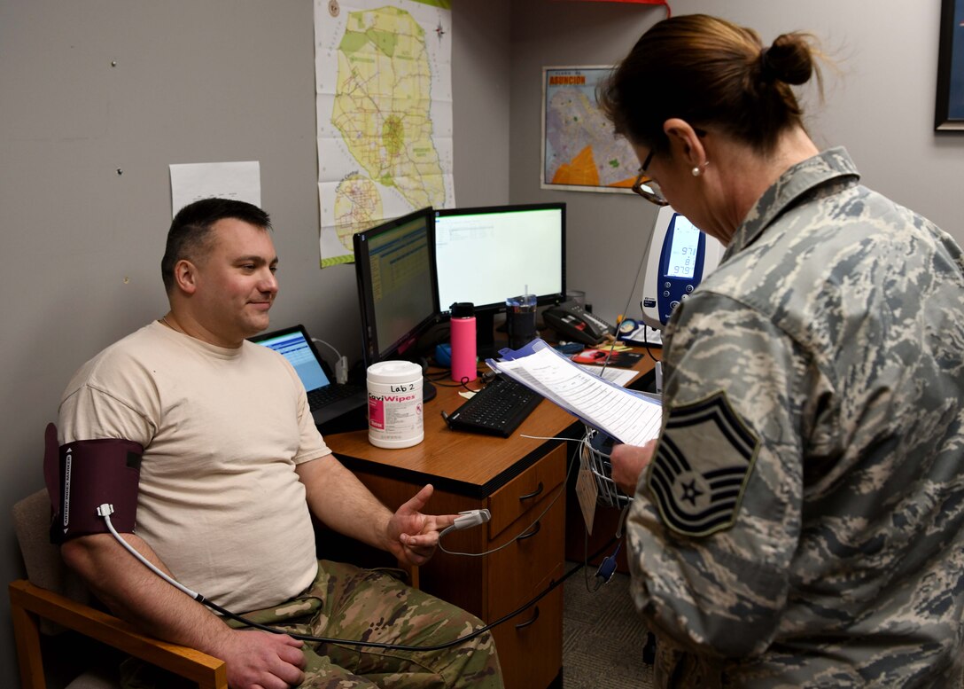 The 104th Fighter Wing's medical group conducts Periodic Health Assessments on March 7, 2020. The PHA is a screening tool used to evaluate the individual medical readiness of Service members.(U.S. Air National Guard photo by Airman Camille Lienau)