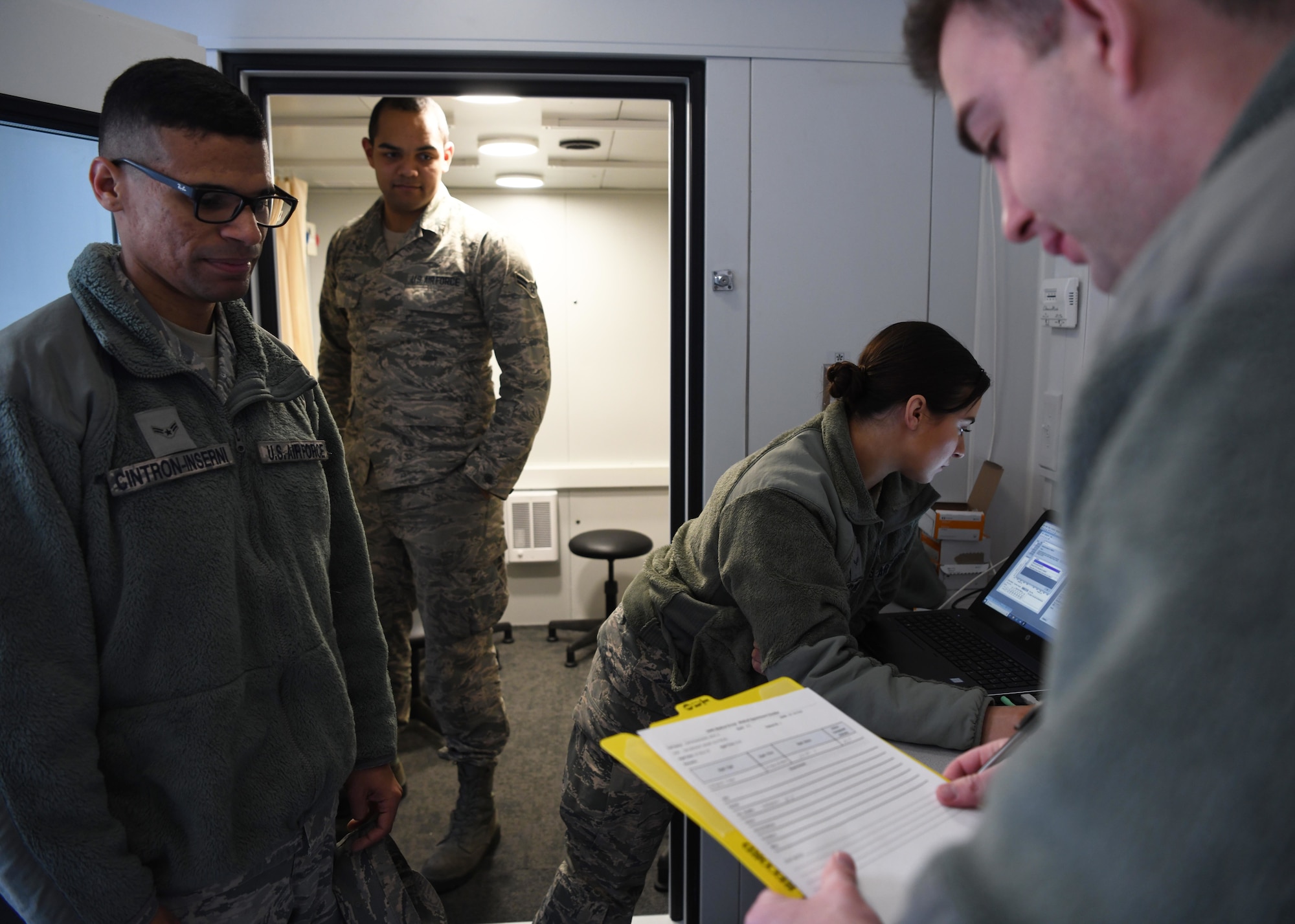 The 104th Fighter Wing's medical group conducts Periodic Health Assessments on March 7, 2020. The PHA is a screening tool used to evaluate the individual medical readiness of Service members.(U.S. Air National Guard photo by Airman Camille Lienau)