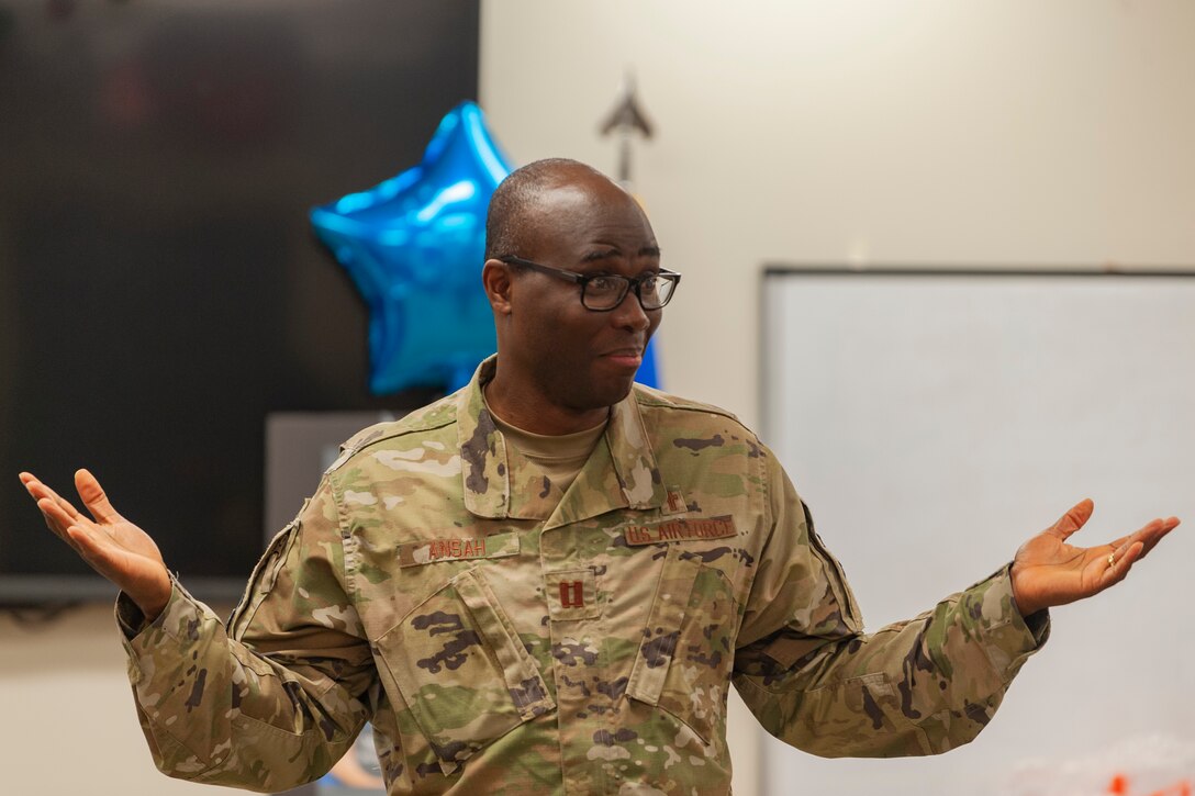 A photo of an Airman giving a briefing