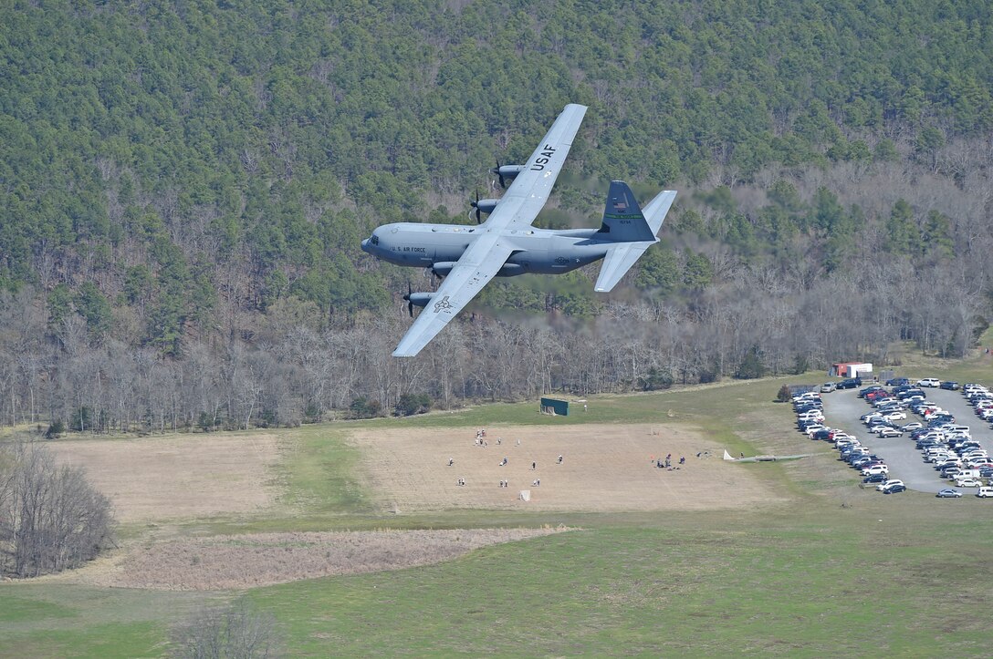 The aircraft flying in formation along a river.