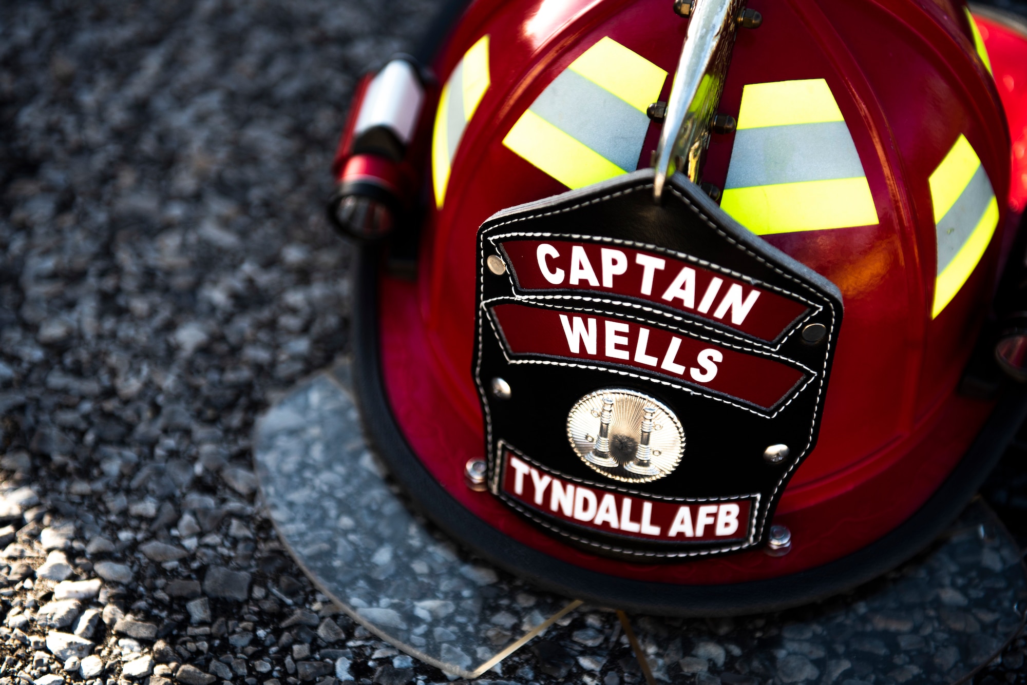 The helmet of Staff Sgt. Jeffery Wells, 325th Civil Engineer Squadron fire department member is pictured at Tyndall Air Force Base, Florida, March 12, 2020. The base participated in a joint exercise which included serval units from Tyndall and local emergency responders. The collaboration served to strengthen community relations and proper patient care during a medical emergency on base. (U.S. Air Force photo by Staff Sgt. Magen M. Reeves)
