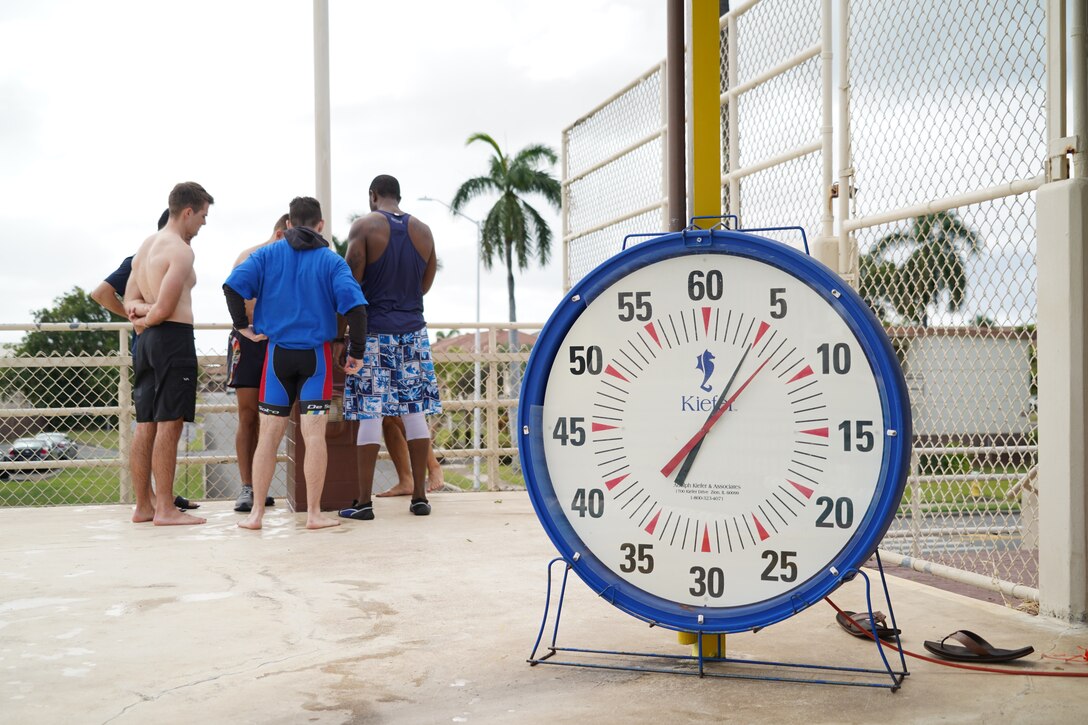 Airmen assigned to the 747th Communications Squadron answer questions during the critical thinking portion of the Toughest Warrior Competition on Joint Base Pearl Harbor-Hickam, Hawaii, March 9, 2020. The week-long event, comprised of six-person teams from various commands, includes physical, critical thinking and team-building challenges held at different locations throughout the installation. (U.S. Air Force photo by Staff Sgt. Nicholas Brown)