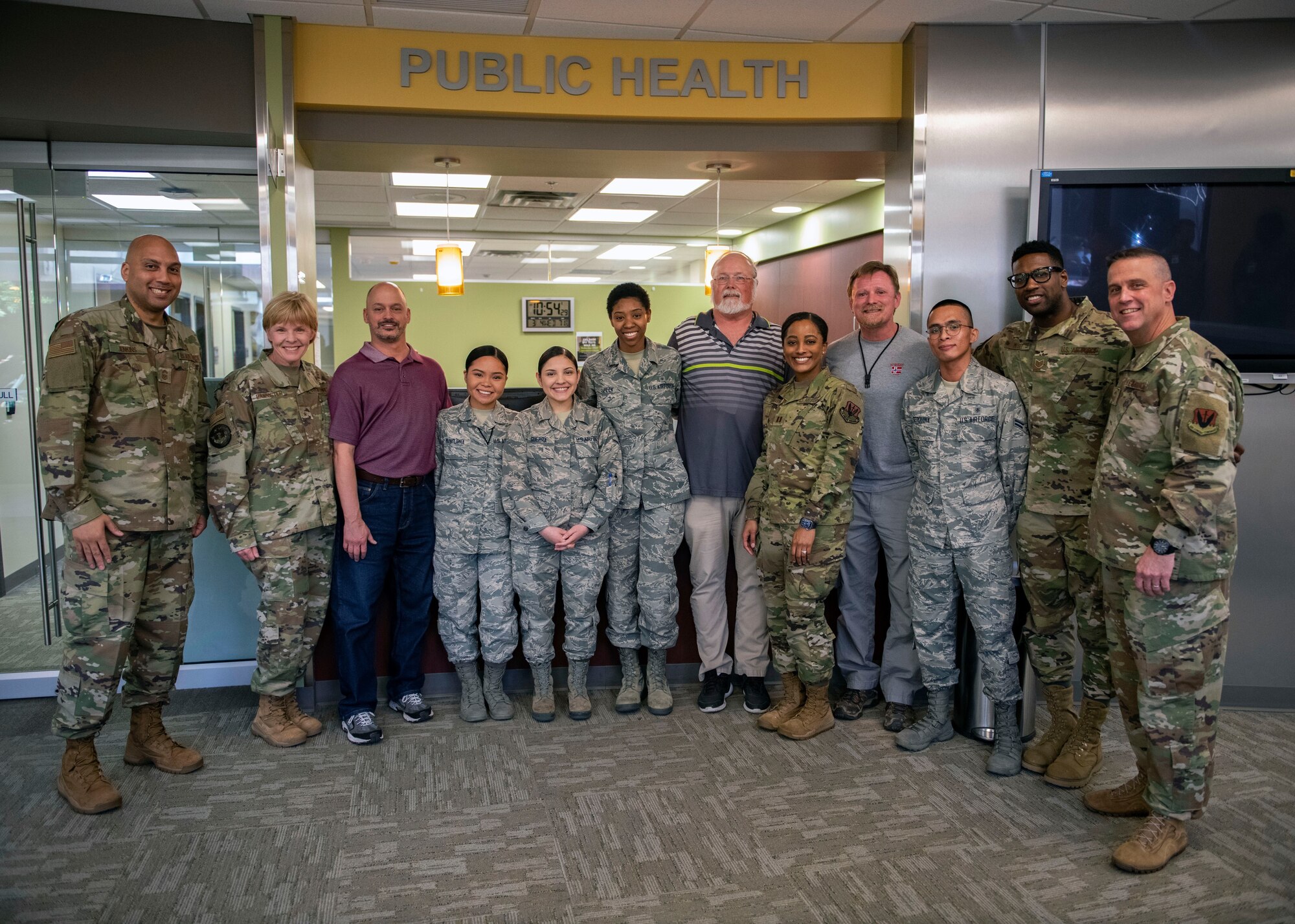 Brig. Gen. (Dr.) Sharon Bannister Air Combat Command surgeon general poses with Airmen from the 9th Operational Medical Readiness Squadron’s Public Health flight.