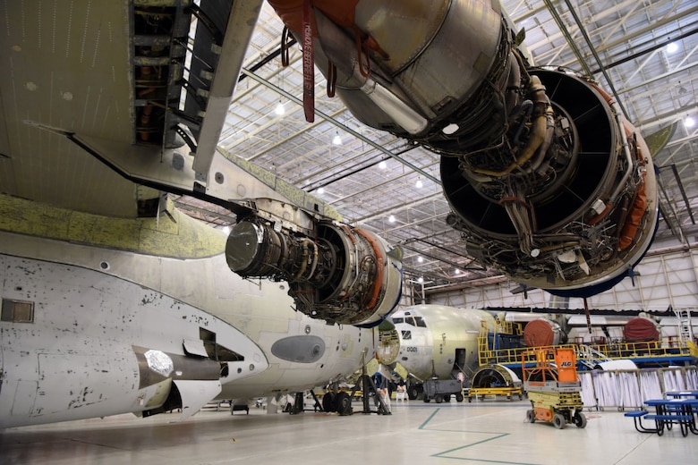 C-17 Globemaster III aircraft undergo maintenance from the 562nd Aircraft Maintenance Squadron at the Warner Robins Air Logistics Complex at Robins Air Force Base, Georgia, A Huntsville Center Utility Energy Services Contract program has a contract in place to energy savings, resilience and security improvements for the WR-ALC, the principal enterprise located at the base.