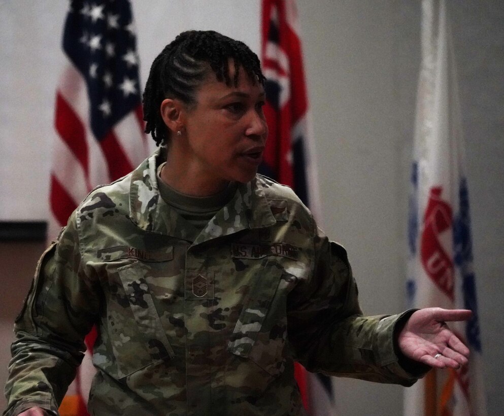 Chief Master Sgt. Sheronne King, the U.S. Pacific Air Force's first sergeant talks to leaders during the Joint Women's Leadership Symposium at Joint Base Pearl Harbor-Hickam, Hawaii, March 11, 2020. The theme for the symposium is "Together we can build a network of diversified leaders to form a dynamic coalition of professionals." (U.S. Air Force photo by Staff Sgt. Nicholas Brown)