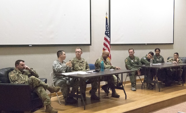 The 56th Air and Space Communications Squadron debates against the 65th Airlift Squadron about the elimination of WAPS Testing during Joint Base Pearl Harbor-Hickam's first-ever Oxford style debate Feb. 29, 2020 at the Hollister Auditorium. After 30 minutes, the 65th AS, who was in favor of eliminating WAPS Testing, was crowned victorious. (U.S. Air Force photo by 2nd Lt. Benjamin Aronson)