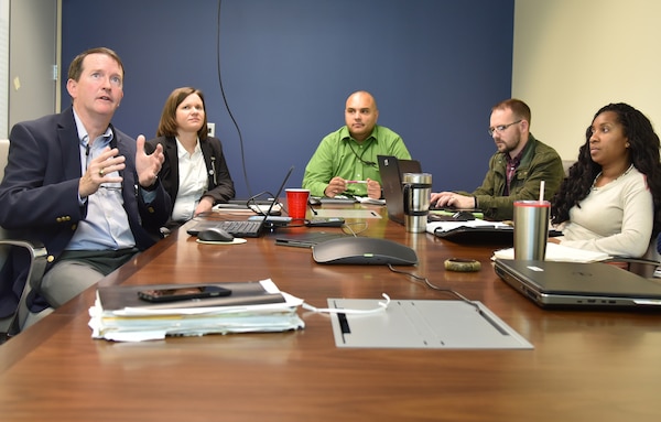 Georgia Power Company representatives Jon Lewis and Heather Cantrell, Georgia Power Company brief Huntsville Center Utility Energy Services Contracting program staff Vick Peltier, Chad Edwards and Brandy Wilkerson during a meeting at Huntsville Center Feb.12. The meeting promoted a cohesive and collaborative project environment for a contract at Warner Robins-Air Logistics Center at Warner Robins Air Force Base, Georgia.