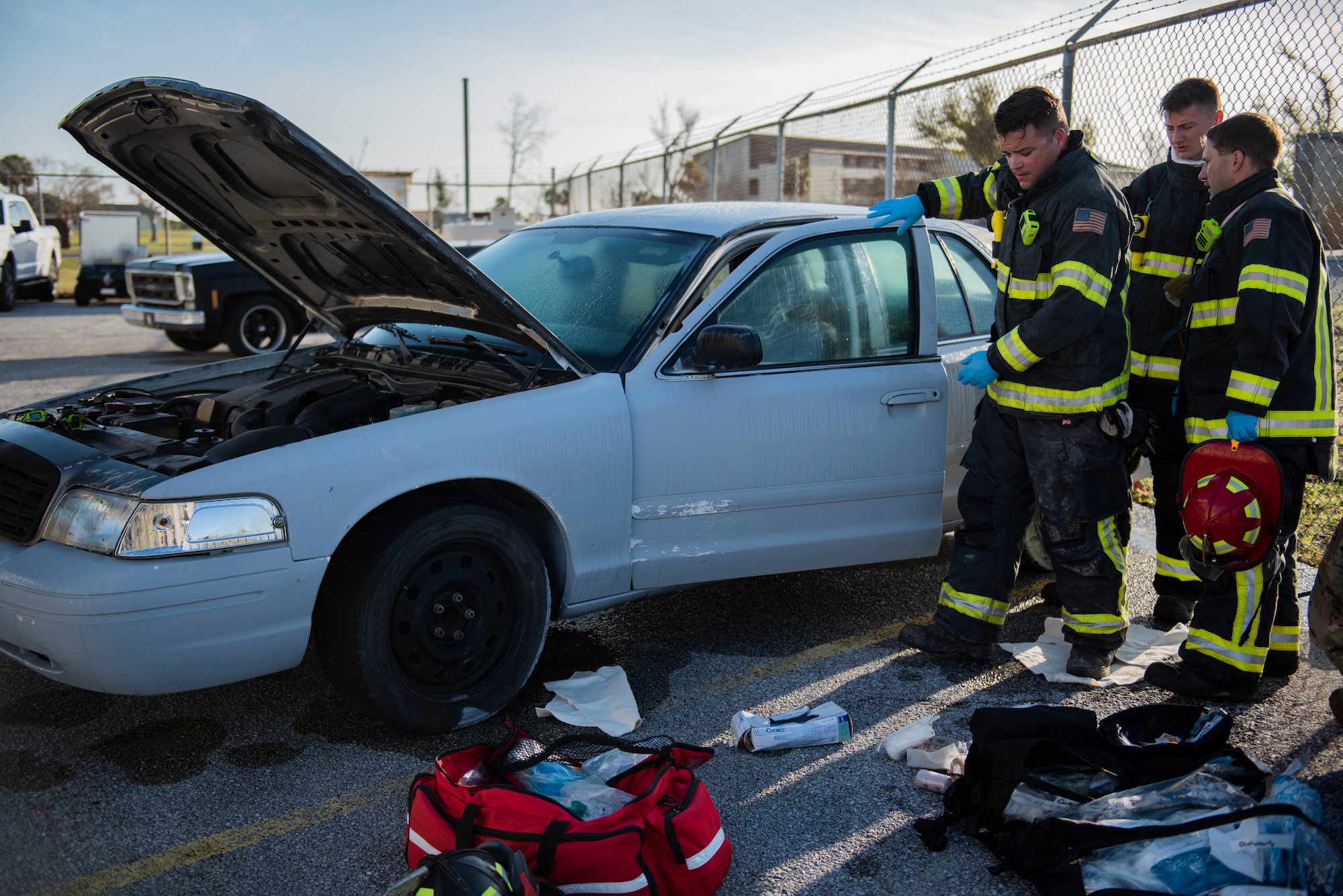 The 325th Civil Engineer Squadron fire department respond to a simulated vehicle fire during a joint training exercise at Tyndall Air Force Base, Florida, March 12, 2020. The exercise included serval units from Tyndall and local emergency responders to strengthen community relations and proper patient care during a medical emergency on base. (U.S. Air Force photo by Staff Sgt. Magen M. Reeves)