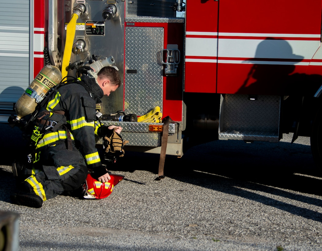 Staff Sgt. Jeffery Wells, 325th Civil Engineer Squadron fire department emergency medical technician, prepares to enter a simulated emergency medical exercise at Tyndall Air Force Base, Florida, March 12, 2020. Emergency responders first called to the scene included the fire department, the 325th Operational Medical Readiness Squadron Ambulance Services Department, and the 325th Security Forces Squadron. (U.S. Air Force photo by 2nd Lt. Kayla Fitzgerald)