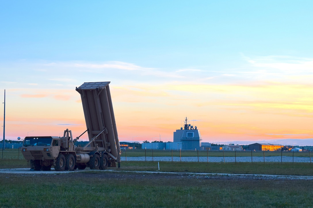 A missile battery points skyward.