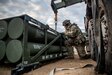 Spc. Dylan Wiley, a multiple launch rocket system (MLRS/HIMARS) crewmember assigned to 1st Battalion, “The Steel Warrior Battalion,”, 14th Field Artillery Regiment, 75th Field Artillery Brigade, Fort Sill, Okla., inspects rocket pods while preparing to reload an M142 High Mobility Artillery Rocket System (HIMARS) during a field training exercise on February 14, 2020, on Fort Sill. The Steel Warrior Battalion continues to train in supporting worldwide contingency as III Corps and Fort Hood only airmobile long-range precision fires capabilities. (U.S. Army photo by Sgt. Dustin D. Biven / 75th Field Artillery Brigade)