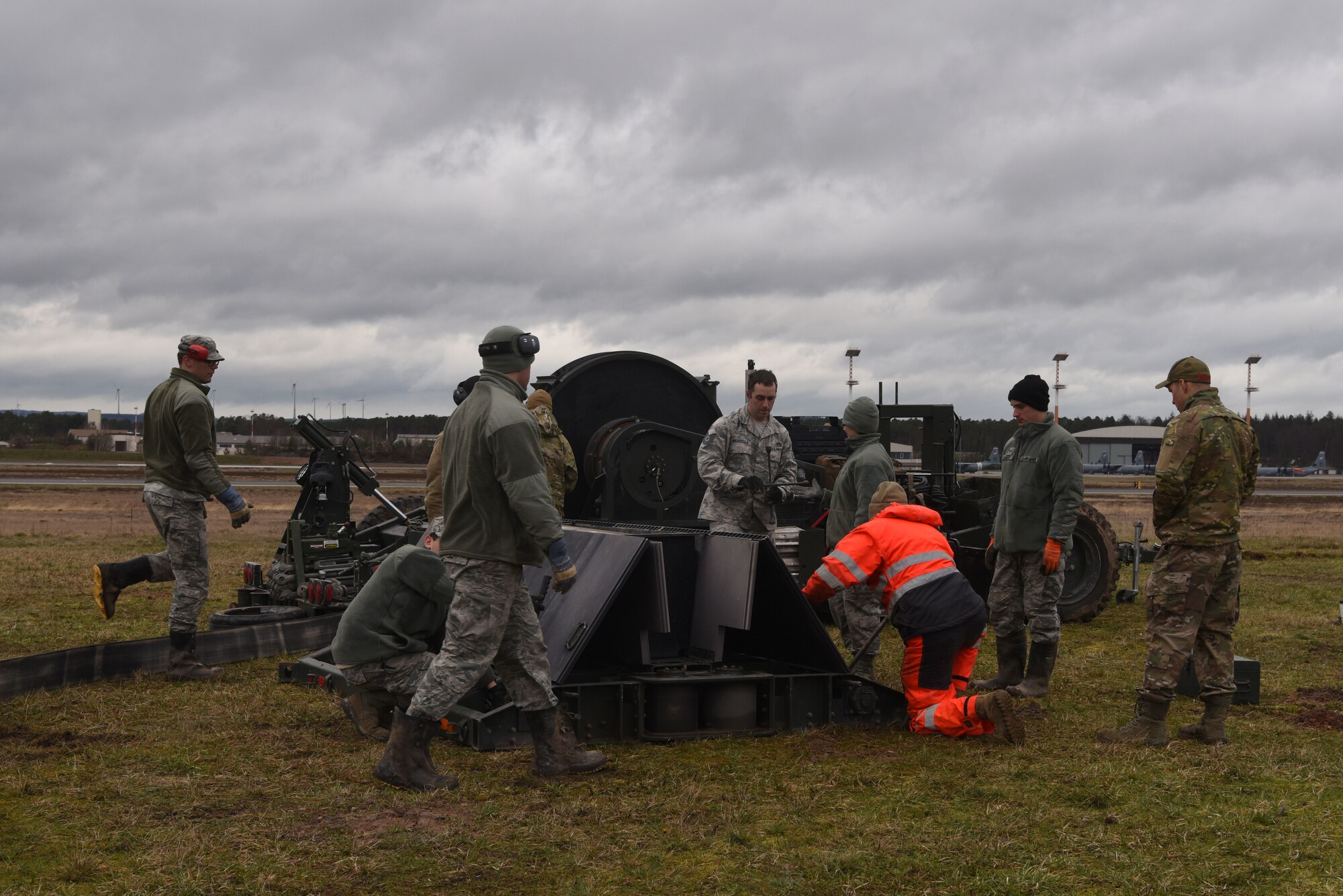 U.S. Airmen assigned to various civil engineer squadrons participate in a mobile aircraft arresting system training course at Ramstein Air Base, Germany, March 11, 2020. The Airmen came from bases spanned across Europe and the U.S. to train with the 435th Contingency Response Squadron. The training taught Airmen how to effectively build and use mobile aircraft arresting systems, which are used to rapidly decrease the speed of aircraft as they land.