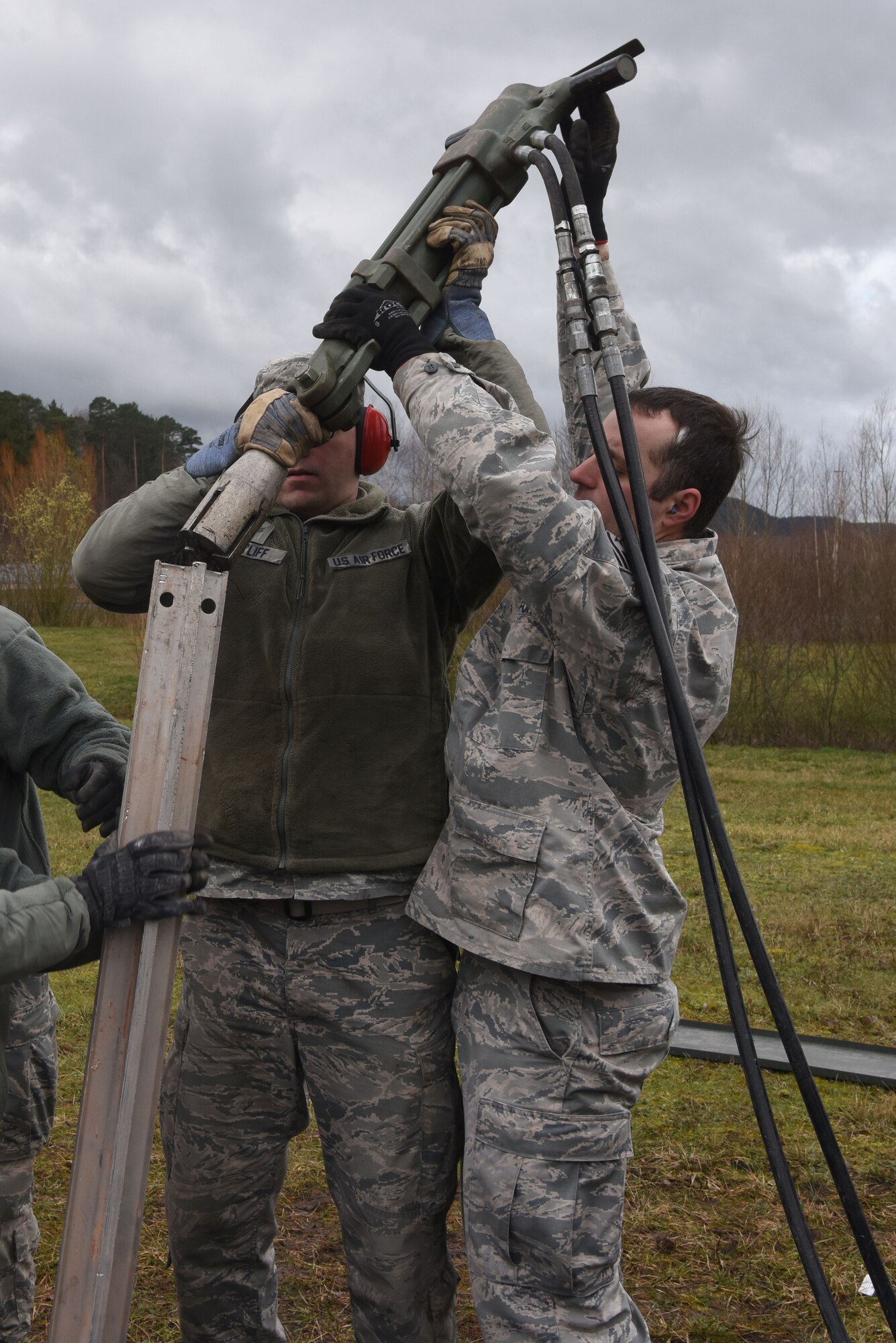 .S. Airmen use a hammer during a mobile aircraft arresting system training course at Ramstein Air Base, Germany, March 11, 2020. Airmen learned how to safely use tools to setup, breakdown and anchor mobile aircraft arresting system. The training teaches Airmen how to effectively build and use mobile aircraft arresting systems, which are used to rapidly decrease the speed of aircraft as they land.