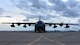 A photo of an HC-130J sitting on the flight line