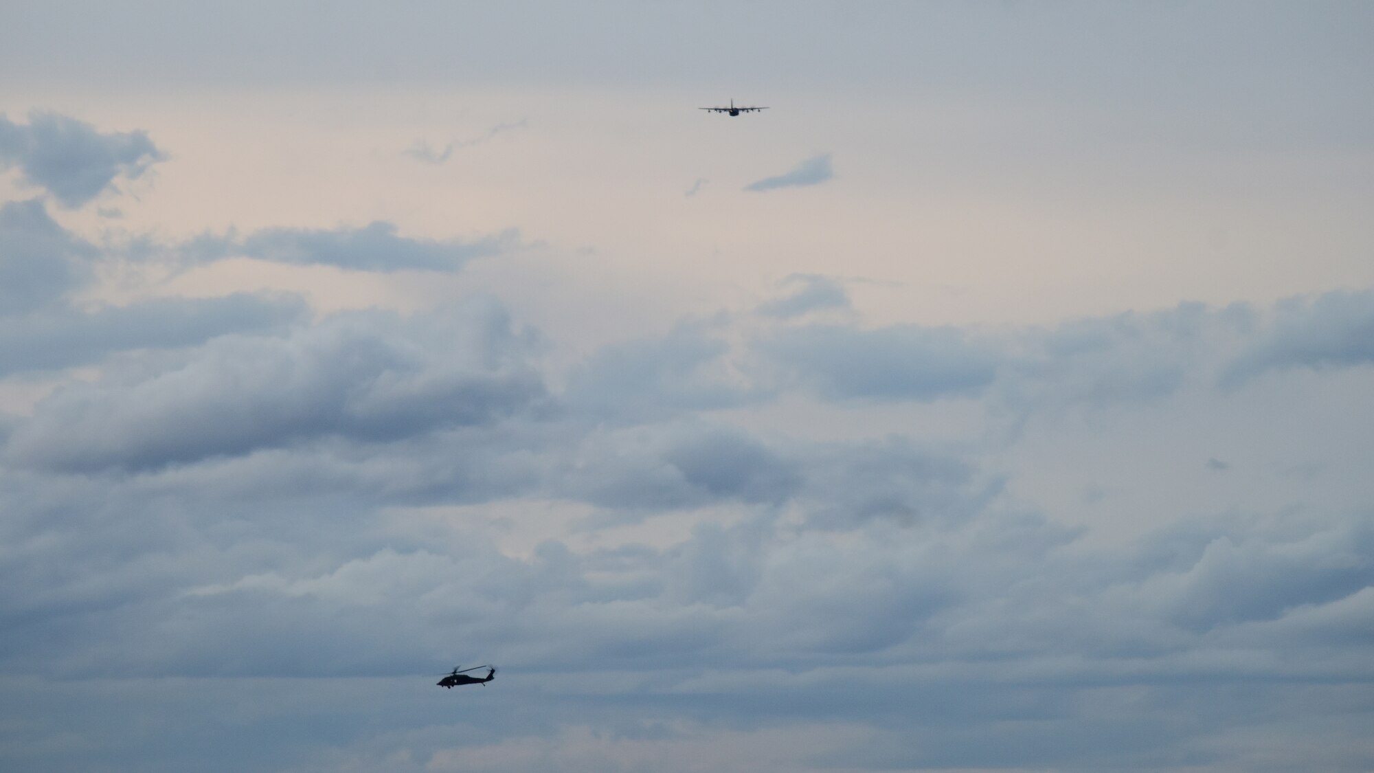 A photo of an HC-130J taking off