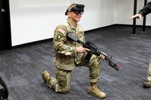 Sergeant Major of the Army, Michael A. Grinston, visited PEO Soldier’s Program Manager Integrated Visual Augmentation System (PM IVAS) at Fort Belvoir, Va on 18 February 2020. Grinston takes a knee in the Soldier Integration Facility (SIF) after engaging in a training raid demonstration.