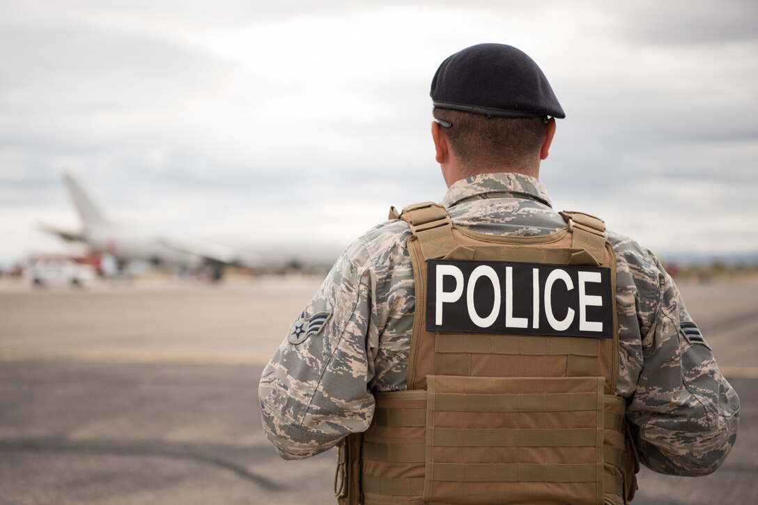 Senior Airman Juan Yepez, a member of the 162nd Security Forces Squadron, Morris Air National Guard Base, Ariz., patrols the perimeter during a training exercise at Tucson International Airport, Ariz., March 10, 2020. The drill provides the 162nd Wing’s security forces team an opportunity to participate in an exercise with hands on training. (U.S. Air Force photo by Senior Airman Aubrey Pomares)