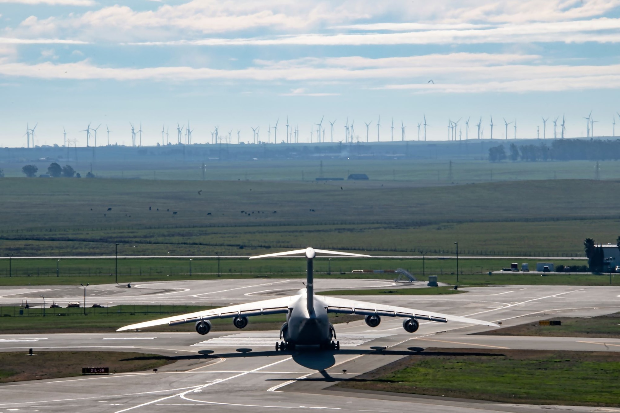 A U.S. Air Force C-5M Super Galaxy taxis onto a runway March 11, 2020, at Travis Air Force Base, California. Travis’ flying squadrons perform flight missions on a daily basis to keep the skills of their pilots sharp and their aircraft in good working order. (U.S. Air Force photo by Senior Airman Christian Conrad)