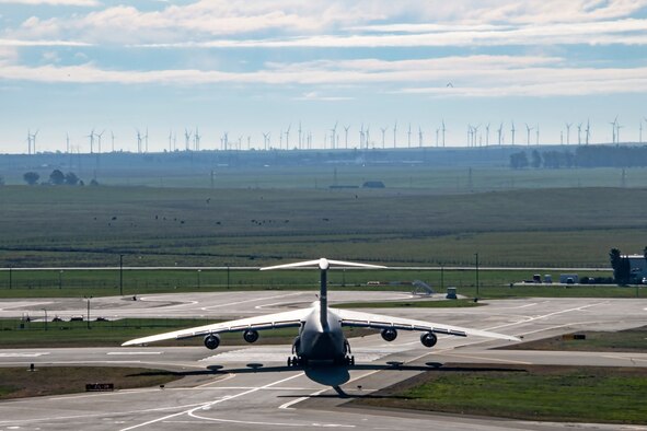 A U.S. Air Force C-5M Super Galaxy taxis onto a runway March 11, 2020, at Travis Air Force Base, California. Travis’ flying squadrons perform flight missions on a daily basis to keep the skills of their pilots sharp and their aircraft in good working order. (U.S. Air Force photo by Senior Airman Christian Conrad)