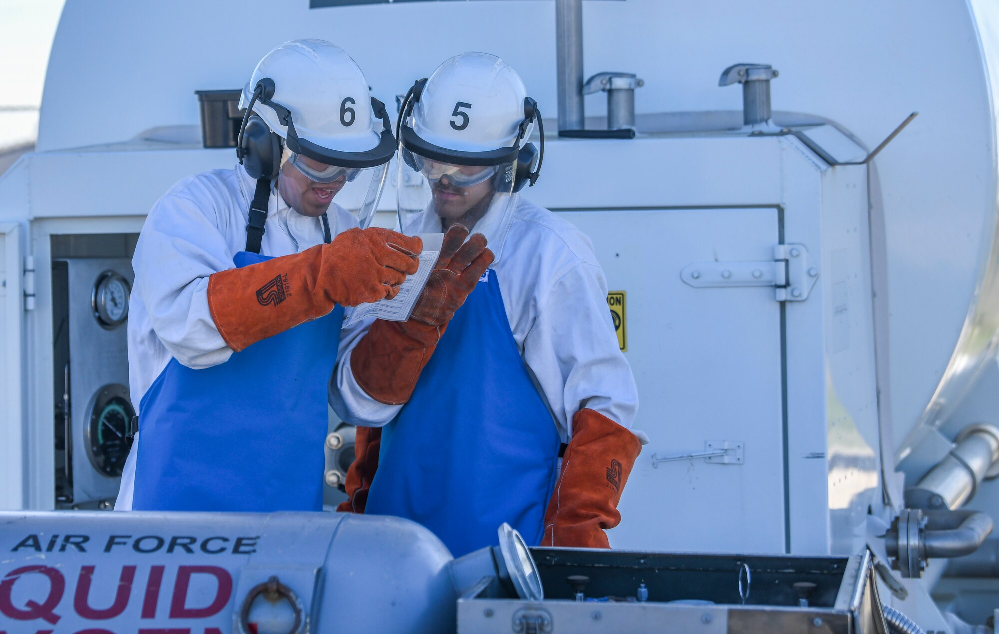 9th Logistic Readiness Squadron (LRS) fuels operators work with Liquid Oxygen