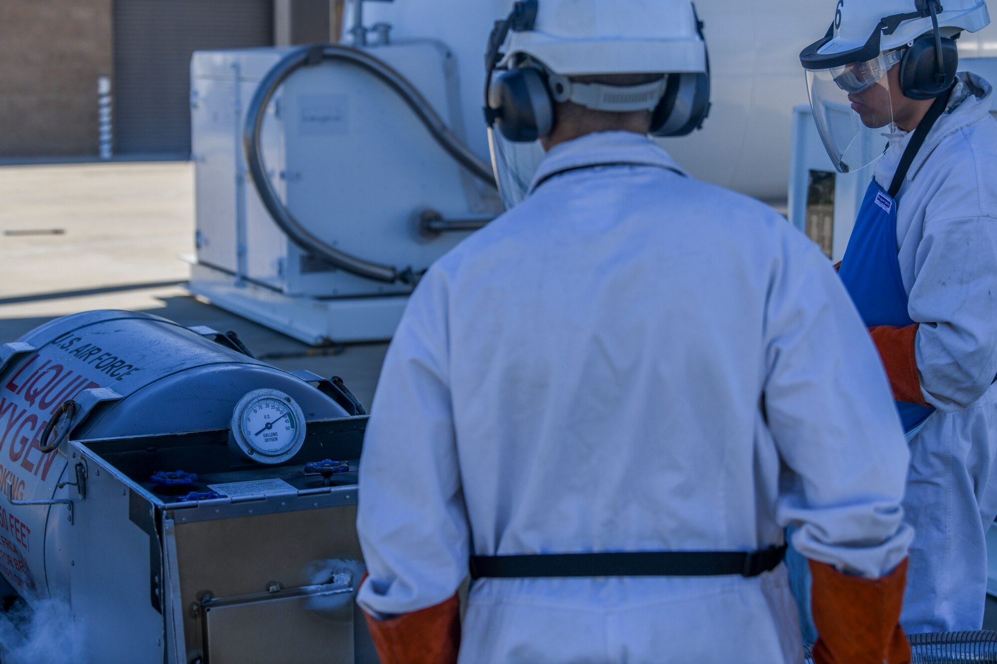 9th Logistic Readiness Squadron (LRS) fuels operators work with Liquid Oxygen