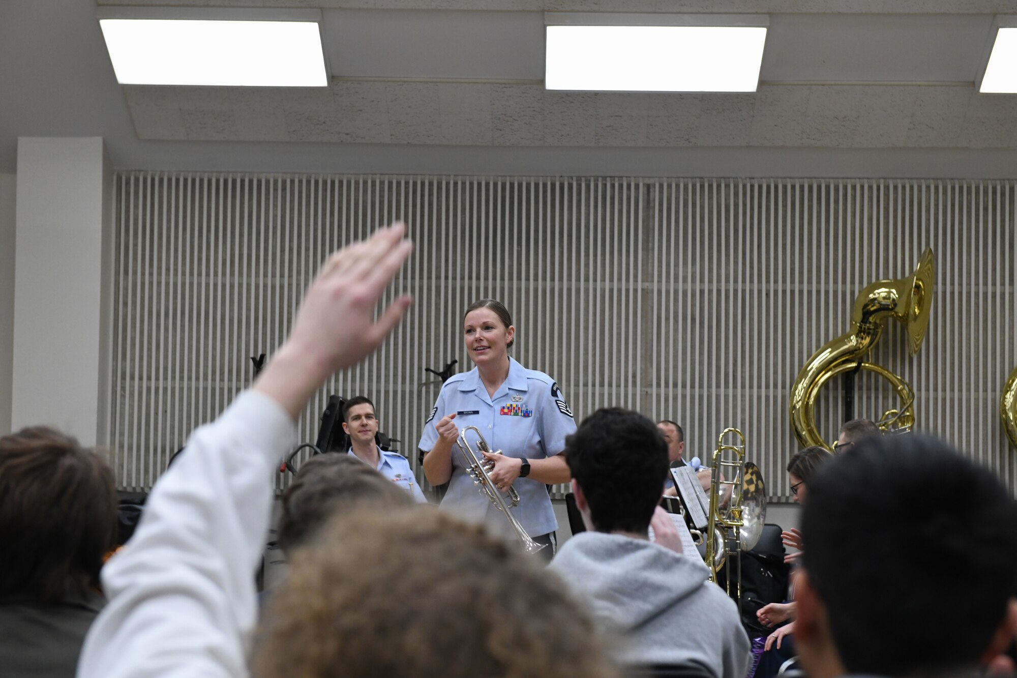 A student raises his hand