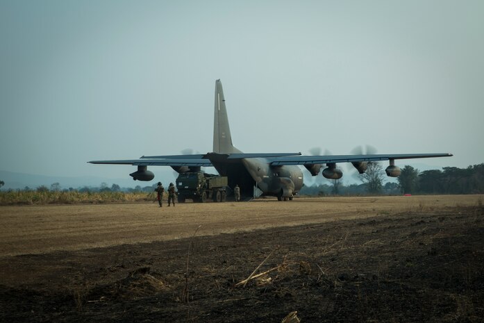 An M142 High Mobility Artillery Rocket System is offloaded from a AFSOC MC-130J Air Command II with the 353rd Special Operations Group during a combined joint HIMARS rapid insertion as part of Cobra Gold 2020 at Chandy Range, Kingdom of Thailand, March 2.