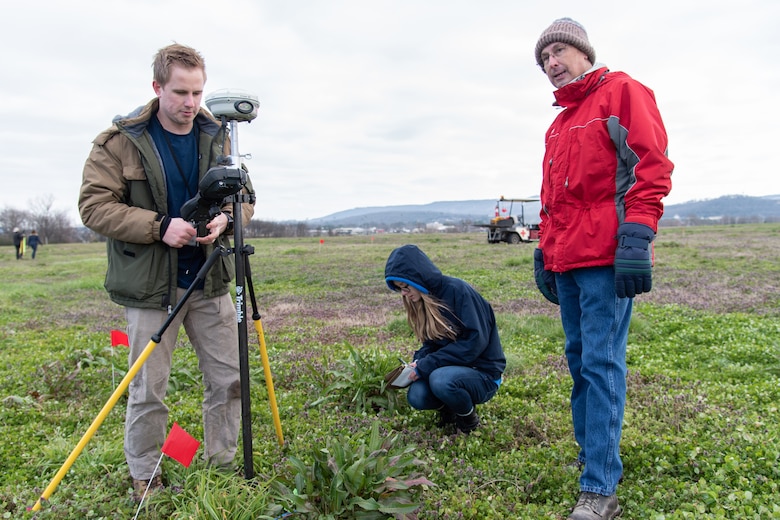 From left: Three members of the U.S. Army Engineering and Support Center, Huntsville – Benton Williams, geophysicist; Ellen Haapoja, student trainee; and William Noel, project manager – work together to plot the locations of inert munitions to evaluate the object-identification abilities of three different unmanned aircraft systems Feb. 27, 2020, at the Rocket City Radio Controllers complex in southeast Huntsville, Alabama. Williams and Haapoja work in the Geosciences Branch of the Engineering Directorate, while Noel works in the Ordnance and Explosives Design Center.