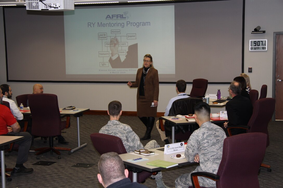 The Air Force Research Laboratory Sensors Directorate kicked off the Wright Connections Mentoring Program provided by the Sensors Directorate Learning office March 6. At the opening event, held at the Sensors Directorate Globalhawk Conference Room, mentors were matched with mentees and had the opportunity to learn a little bit about one another. Jacqueline Janning-Lask, a member of the senior executive service, and Sensors Director provided opening comments. (U.S. Air Force photo/Ted Pitts.)