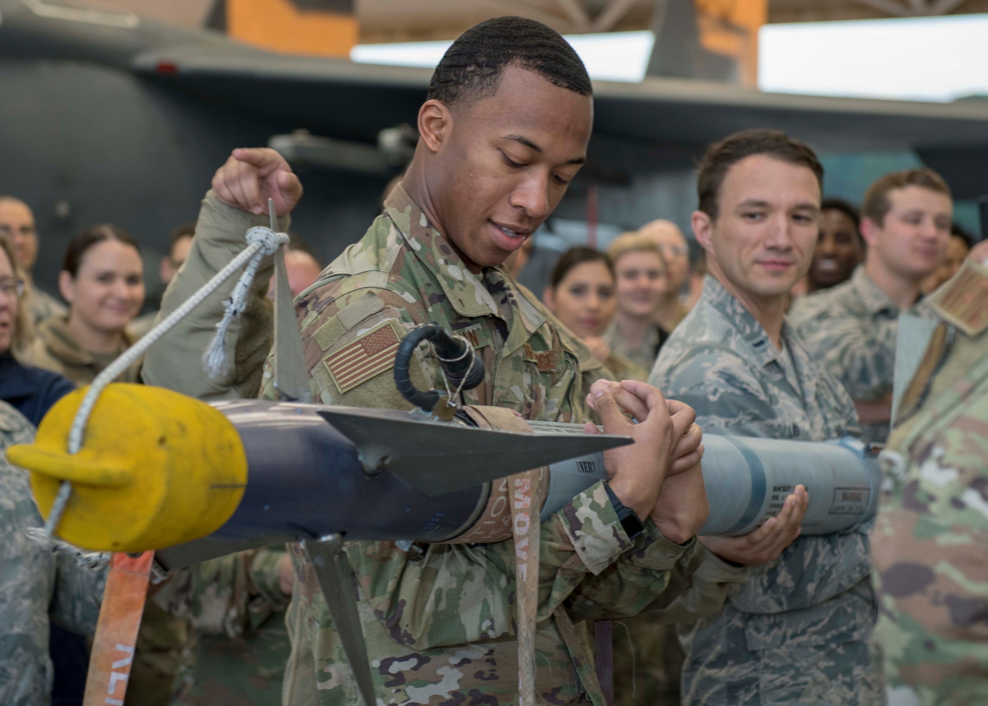 Airmen from the 4th Medical Group visited the 4th Maintenance Group aircraft maintenance qualification program to learn about the F-15E Strike Eagle and the various types of munitions that can be mounted on it. This opportunity gave the 4th MDG team members further insight on the 4th Fighter Wing mission and the physical impact the job has on Airmen.