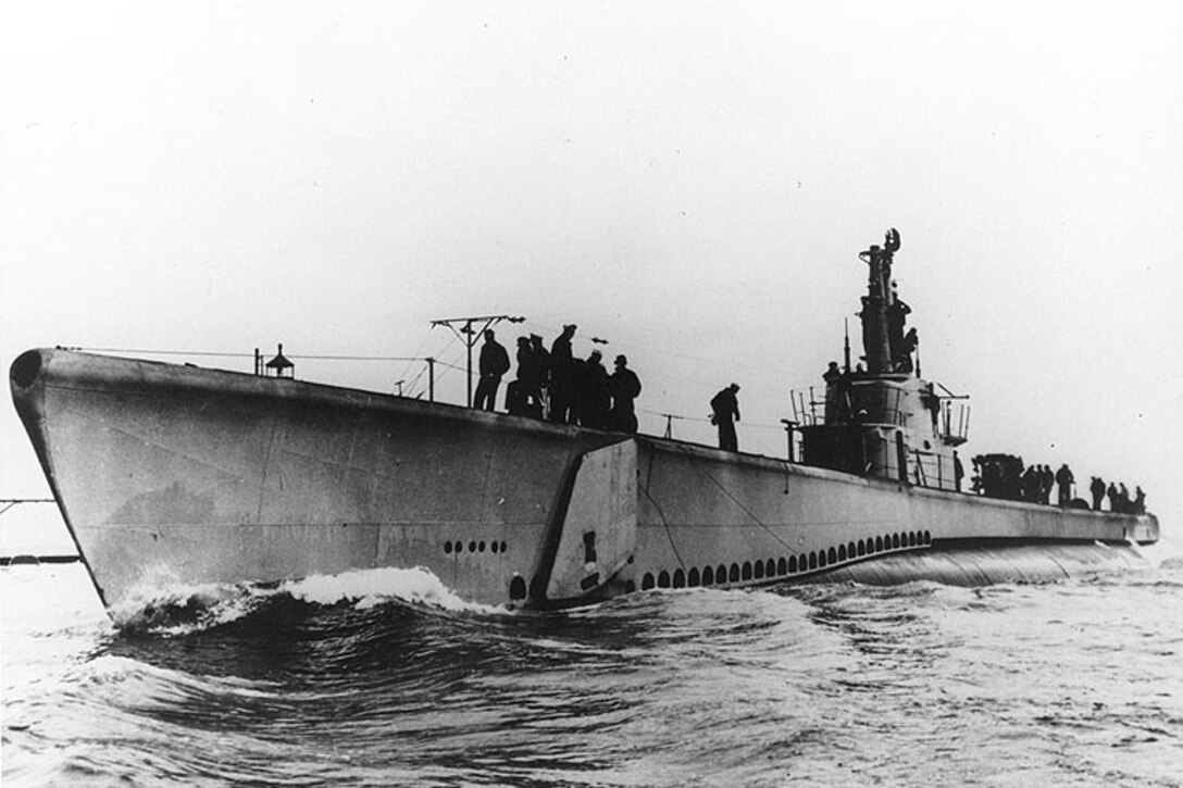 Submarine floats on surface.