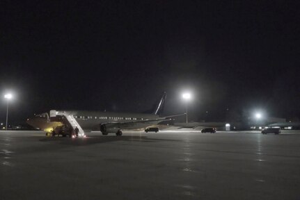 An aircraft carrying Wisconsin citizens returning from the Grand Princess cruise ship with confirmed cases of the COVID-19 virus arrives at Volk Field Combat Readiness Training Center at Camp Douglas, Wisconsin, March 15, 2020. Wisconsin National Guard Soldiers and Airmen transported the residents to their homes for self-quarantine.