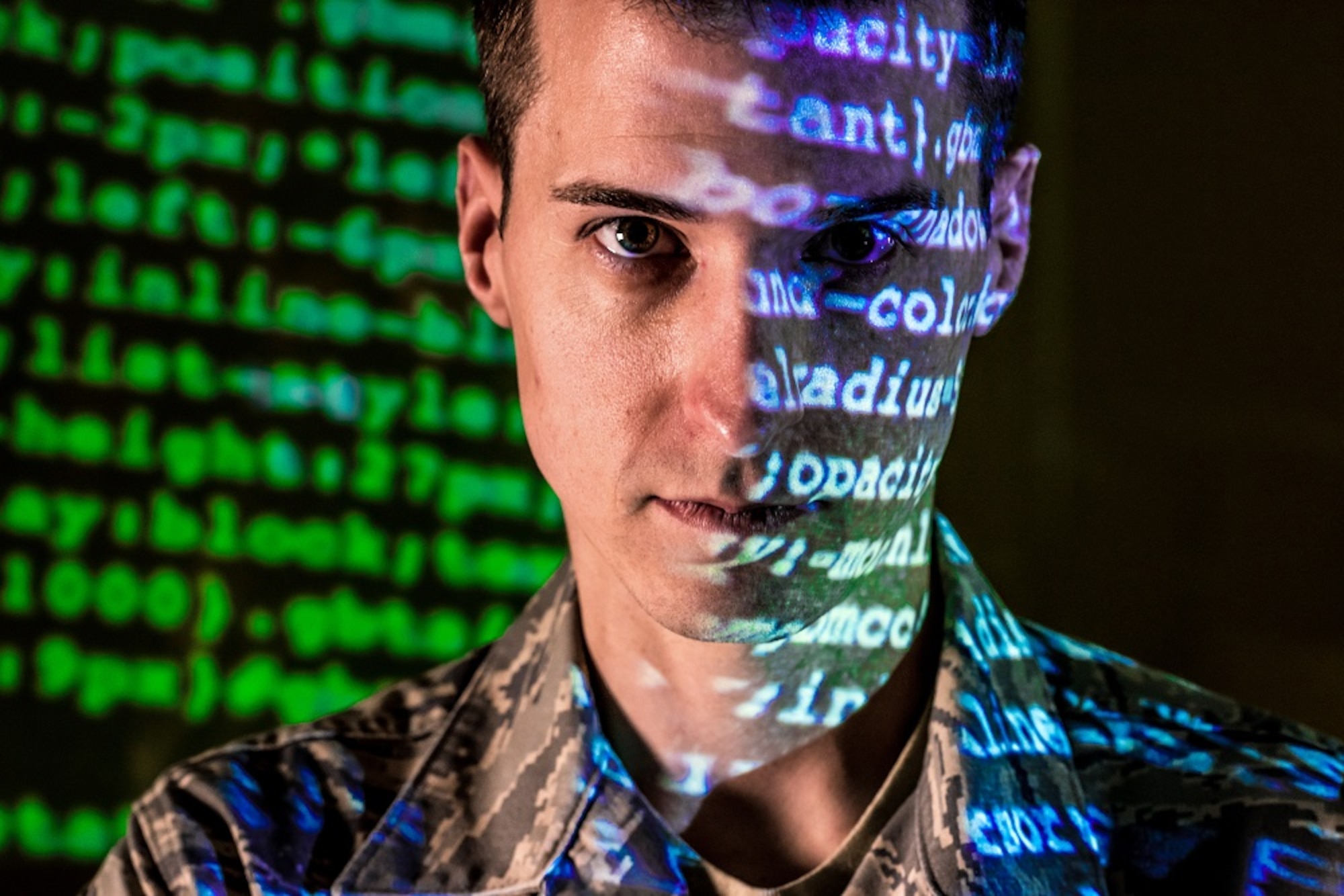 Tech Sgt. Kyle Hanslovan is a cyber-warfare specialist serving with the 175th Cyberspace Operations Group of the Maryland Air National Guard at Warfield Air National Guard Base, Middle River, Md. in this October 2017 photo. Hanslovan served on active duty with the Air Force for six years and then worked, in civilian life, as a cyber security contractor for the Department of Defense and now as the CEO of a cyber security start up firm. His continuing desire to serve his country led him to the Air National Guard, where he believes his civilian experience in defensive cyber-security greatly benefits his mission readiness for offensive cyber operations with the U.S. Air Force. (U.S. Air Force photo/J.M. Eddins Jr.)