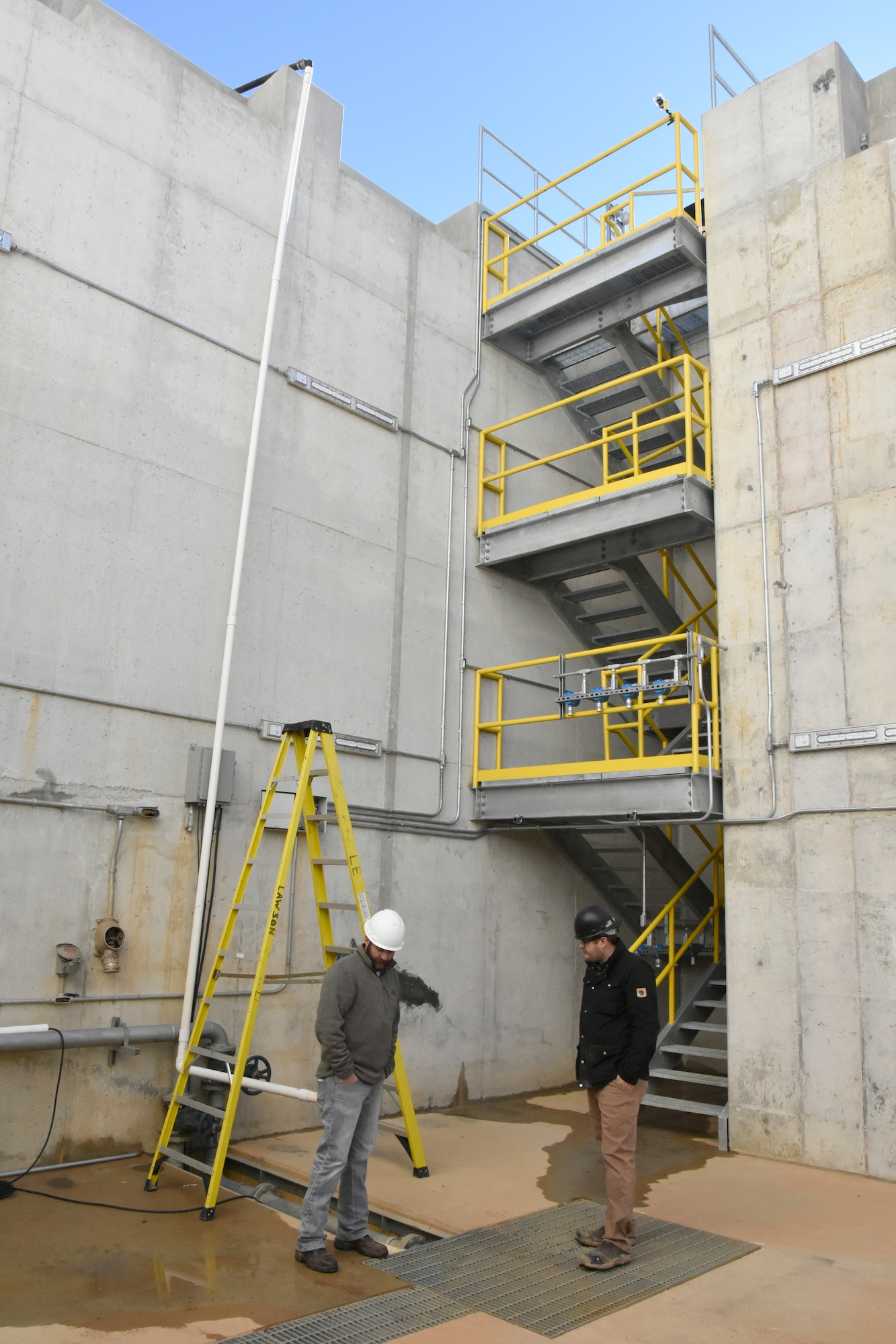 Hypersonic Test Capability Improvement (HTCI) Technical Lead Jonathan Osborne, right, and Project Engineer Chris Rogers, both of whom work for Perikin Enterprises, inspect an area of the Block 1 heater pit below the under-renovation HTCI Project test facility Jan. 6, 2020, at Arnold Air Force Base, Tenn. A team of Arnold Engineering Development Complex engineers is heading up this effort, and the goal of the HTCI Project, nicknamed “Project Phoenix,” is to transform the J-5 facility to support future hypersonic weapon acquisition and research and development programs. The pit will house the heaters that allow the facility to test at hypersonic conditions. (U.S. Air Force photo by Bradley Hicks)