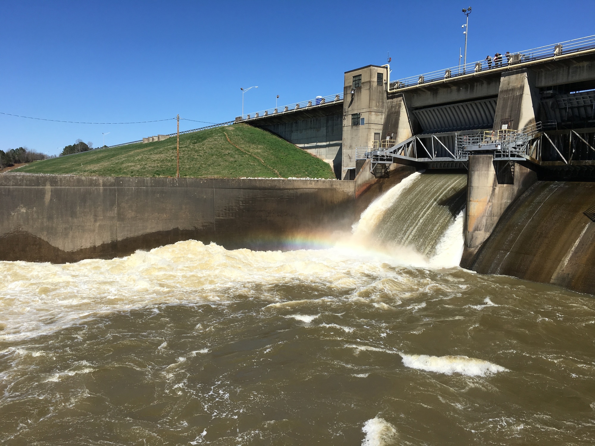 Water rushes from the AEDC Woods Reservoir Dam at Arnold Air Force Base. (U.S. Air Force photo)