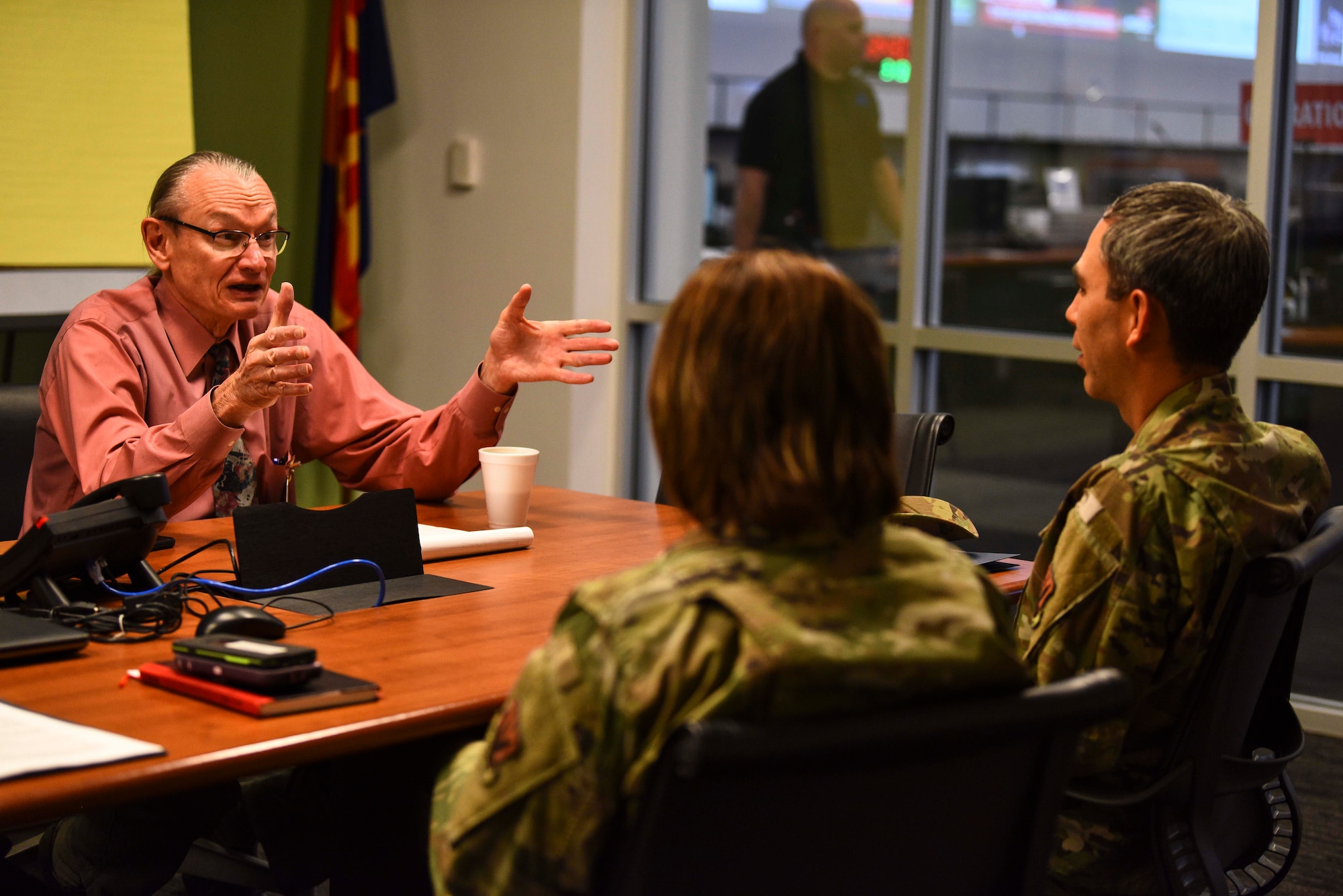 A photo of individuals discussing