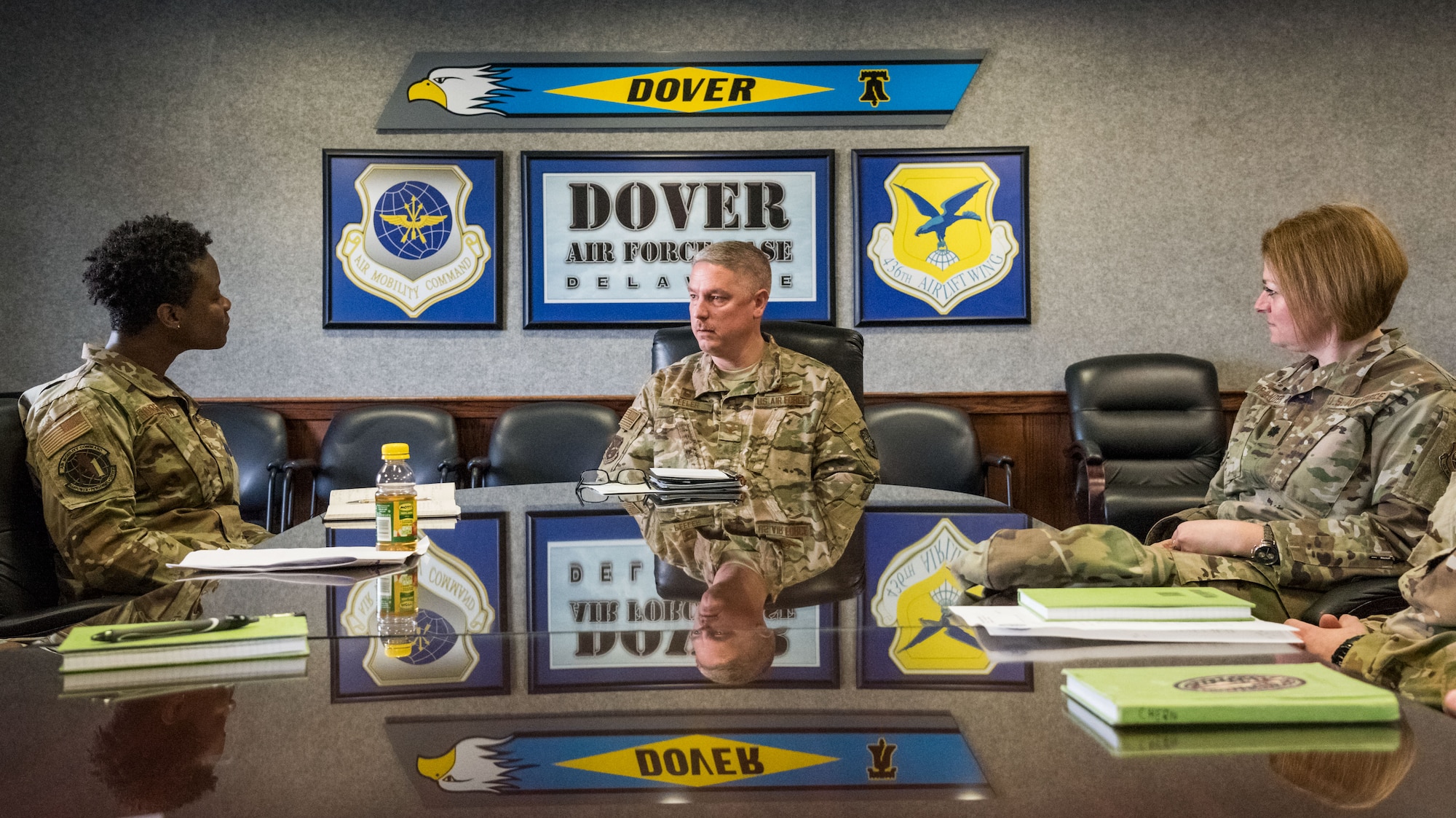 Col. Angenene Robertson, Air Mobility Command director of manpower, personnel and services, Scott Air Force Base, Illinois, listens to Col. Michael Peeler, 436th Operations Group commander and Lt. Col. Brooke Brander, 436th Force Support Squadron commander, March 11, 2020, on Dover AFB, Delaware. Robertson visited the base for an immersion, where she learned in-depth details about many organizational missions and day-to-day operations including the Air Force Mortuary Affairs Operations and AFMES. (U.S. Air Force photo by Roland Balik)
