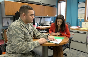 Clare Long, 132d Wing Airmen and Family Readiness Program Manager and accredited financial counselor (AFC), talks to 2nd Lt. Micah Green, 168th cyber operations officer, during financial briefings on February 8, 2020, at the 132d Wing, Des Moines, Iowa. Financial literacy is a key factor in ensuring Airmen maintain their security clearances. (Iowa Air National Guard Senior Airman Katelyn Sprott)