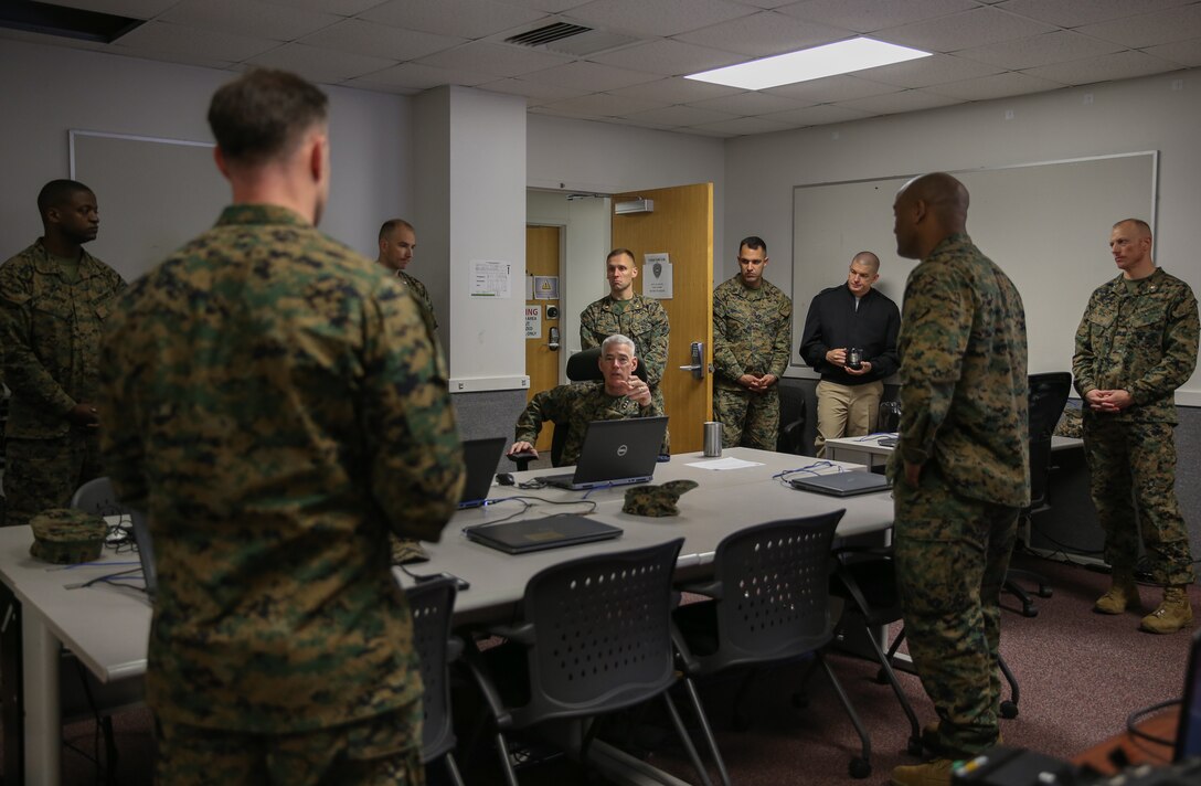 U.S. Marine Corps Lt. Gen. Brian D. Beaudreault, commanding general, II Marine Expeditionary Force, interacts with Marines during the end of Cyber Fury 2020 at Camp Lejeune, N.C., Feb. 28, 2020. Cyber Fury is an annual training exercise that allows Marines to simulate a series of cyber space attacks by identifying and countering them. (U.S. Marine Corps photo by Lance Cpl. Haley McMenamin)