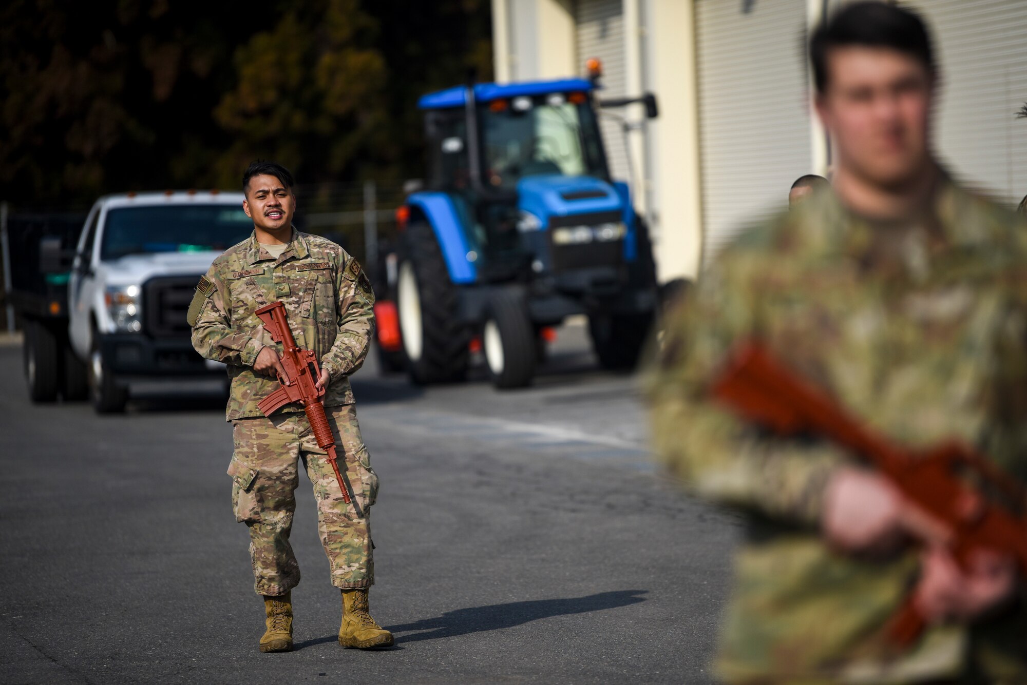 U.S. Air Force Senior Airman John Kuthmann, a patrolman with the 35th Security Forces Squadron, instructs other Airmen on how to perform security sweeps during an Agile Combat Employment practice capstone event at Misawa Air Base, Japan, March 13, 2020. During the event, Airmen switched out from assisting with other tasks to learn how to properly and safely perform patrols. (U.S. Air Force photo by Tech. Sgt. Timothy Moore)