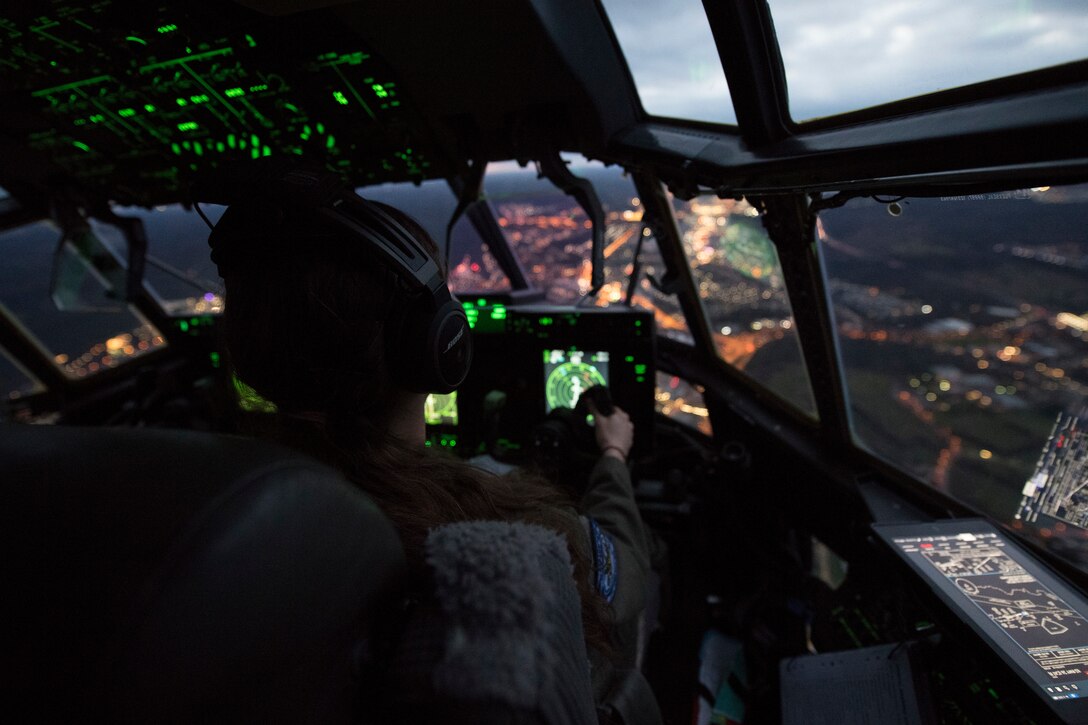 U.S. Air Force Maj. Mary Baldwin, 37th Airlift Squadron C-130J Super Hercules aircraft pilot, approaches Ramstein Air Base.