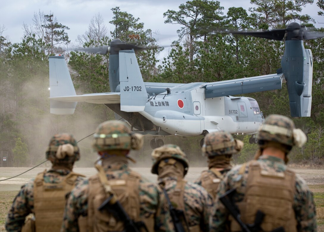 Marines with Expeditionary Operations Training Group prepare for Helicopter Rope Suspension Techniques from a Japan Ground Self-Defense Force V-22 Osprey at Stone Bay, Camp Lejeune, N.C., Feb. 12, 2020. The JGSDF trained with Marine Medium Tiltrotor Training Squadron 204 to expand mission capabilities. (U.S. Marine Corps photo by Cpl. Ethan Pumphret)