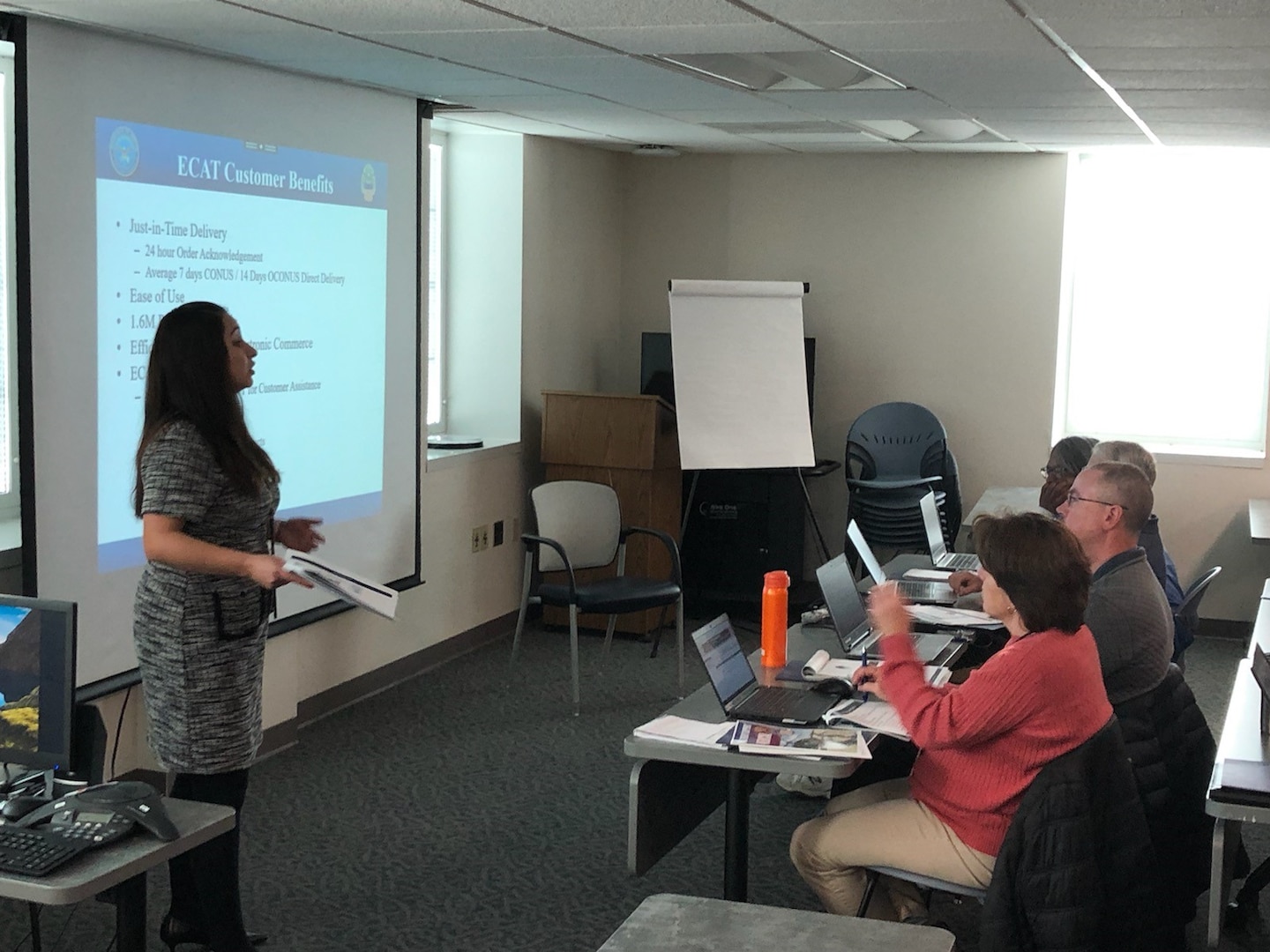 Gabriela Moraga, a Medical tailored vendor logistics specialist, left, presents to a classroom of Department of Veterans Affairs personnel at the Charles George VA Medical Center Dec. 11, 2019 in Asheville, North Carolina.