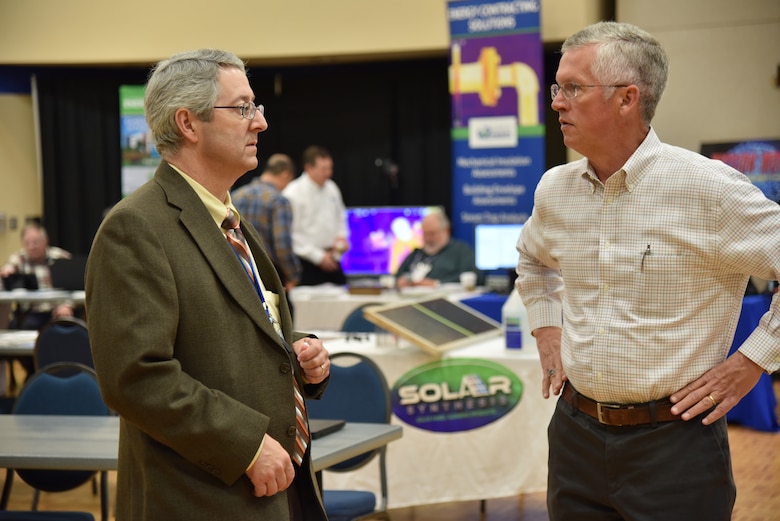 John Trudell, Huntsville Center Resource Efficiency Manager program manager, and Dan Howett, Federal Account Representative, Carrier Corporation, discusses the Chillers 101 presentation Howett made during the Army REM Workshop 2020 at the University of Alabama-Huntsville campus March 10-12.
