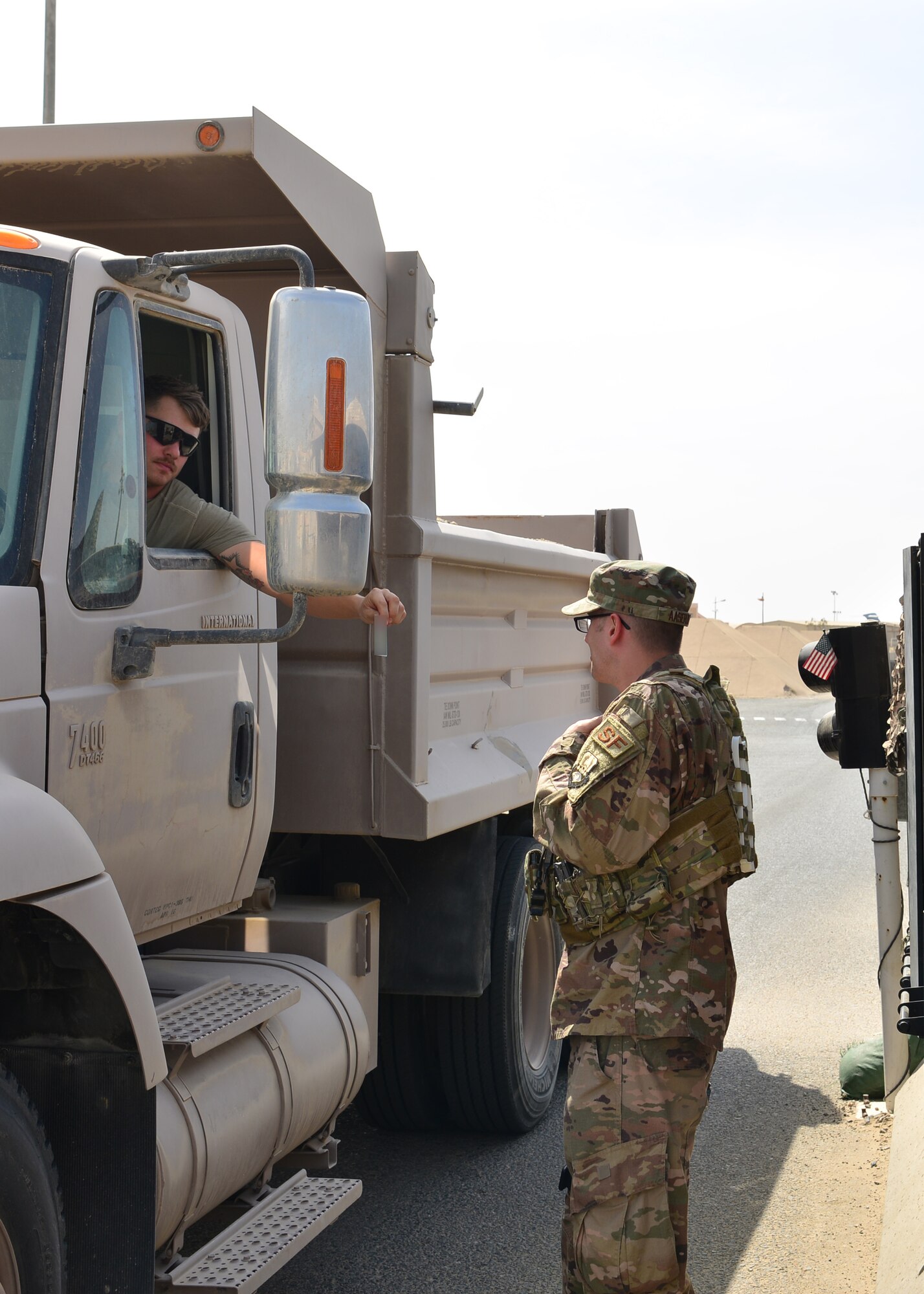 Airman checks a person’s identification