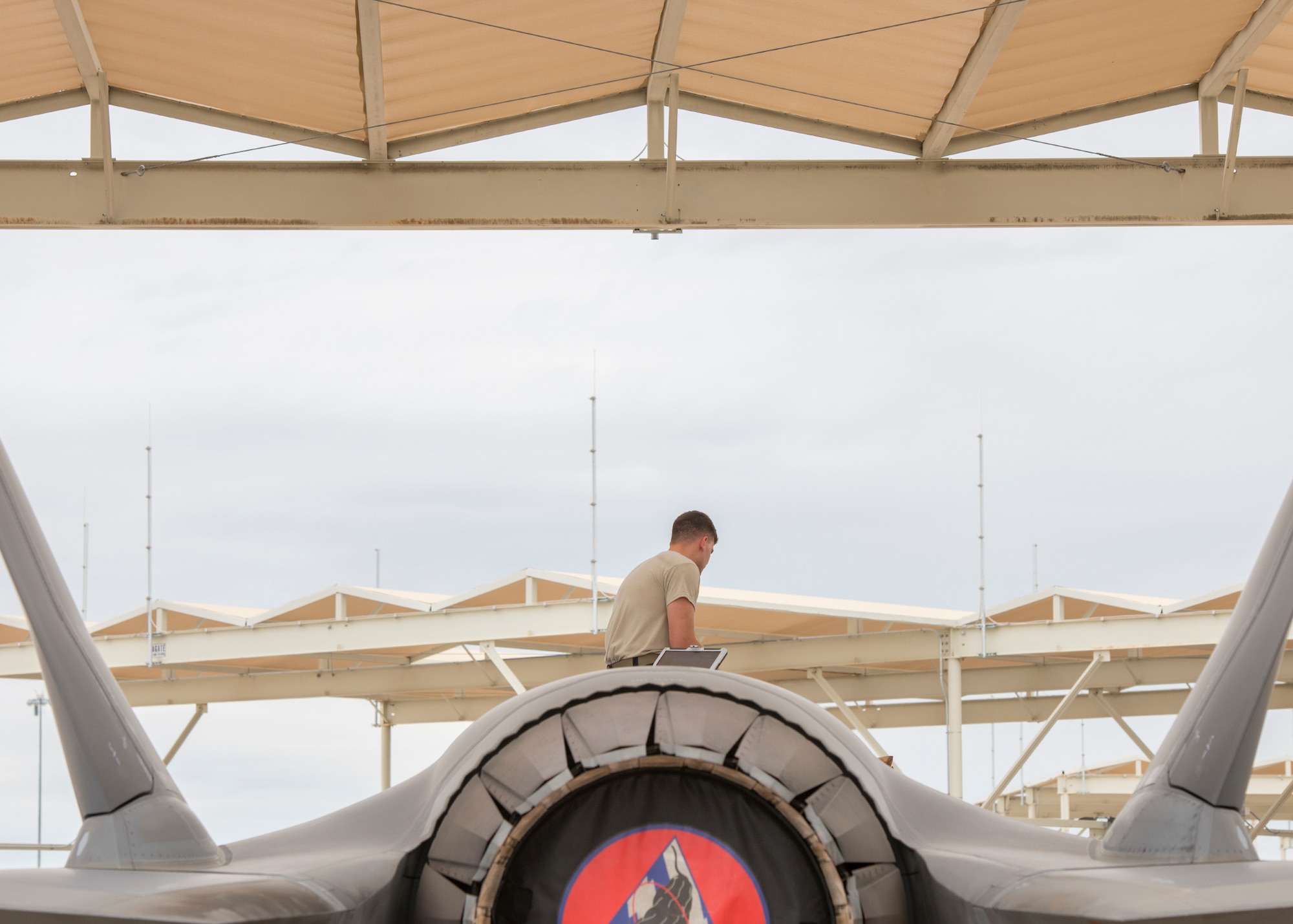 Senior Airman Brenden Hansen, 56th Component Maintenance Squadron maintainer, inspects a component on an F-35A Lightning II, March 10, 2020 at Luke Air Force Base, Ariz.