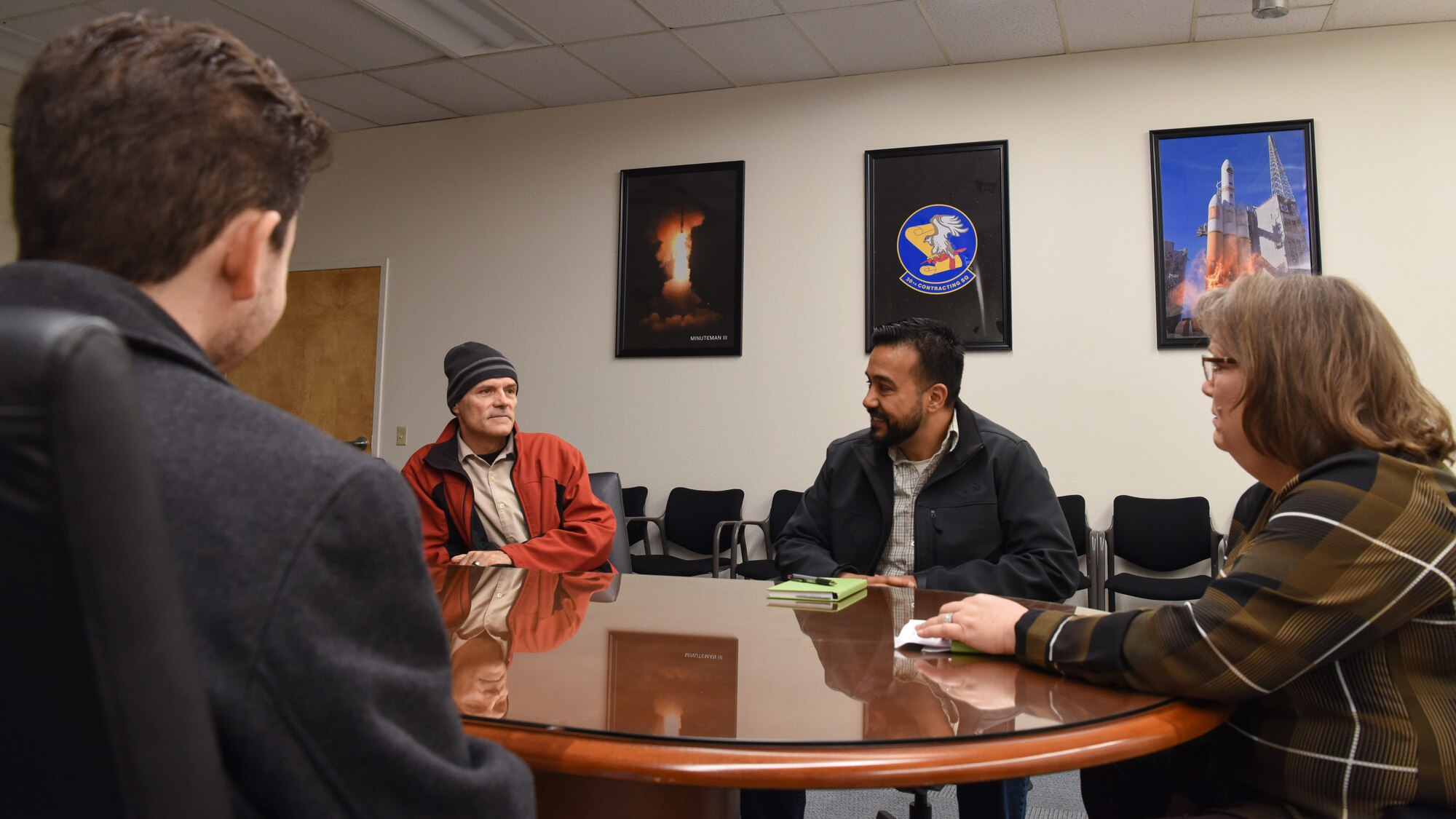 Photo of people meeting around a table