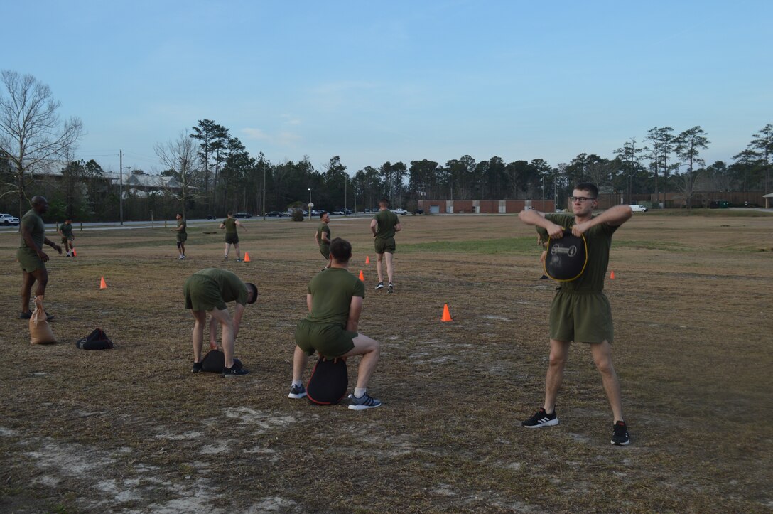 8th Communication Battalion Headquarters Company morning PT with instructors from the HITT Gym.